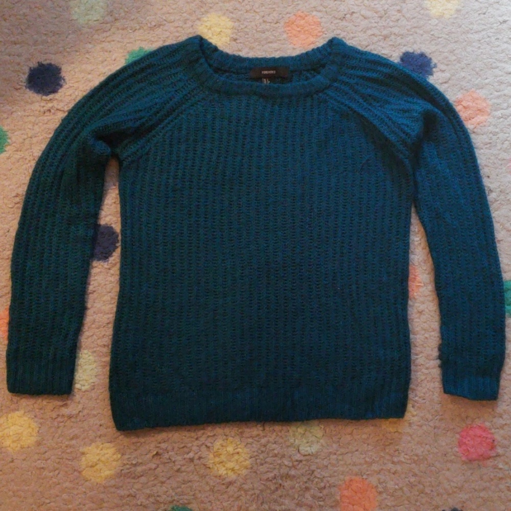 Cable knit sweater.